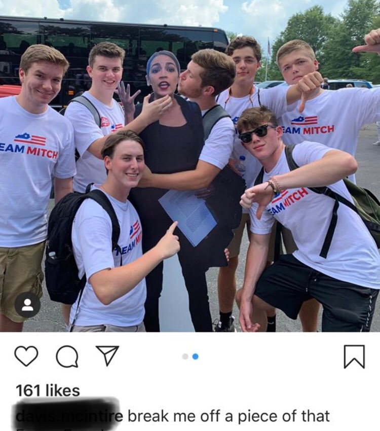 Team Mitch youth fondling and chocking AOC cutout with the text break me off a piece of that.